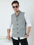 Model wearing Men’s Sustainable Cotton Modi Coat Black styled with kurta
