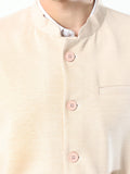 Button-front detailing on Sustainable Cotton Modi Coat Chandan

