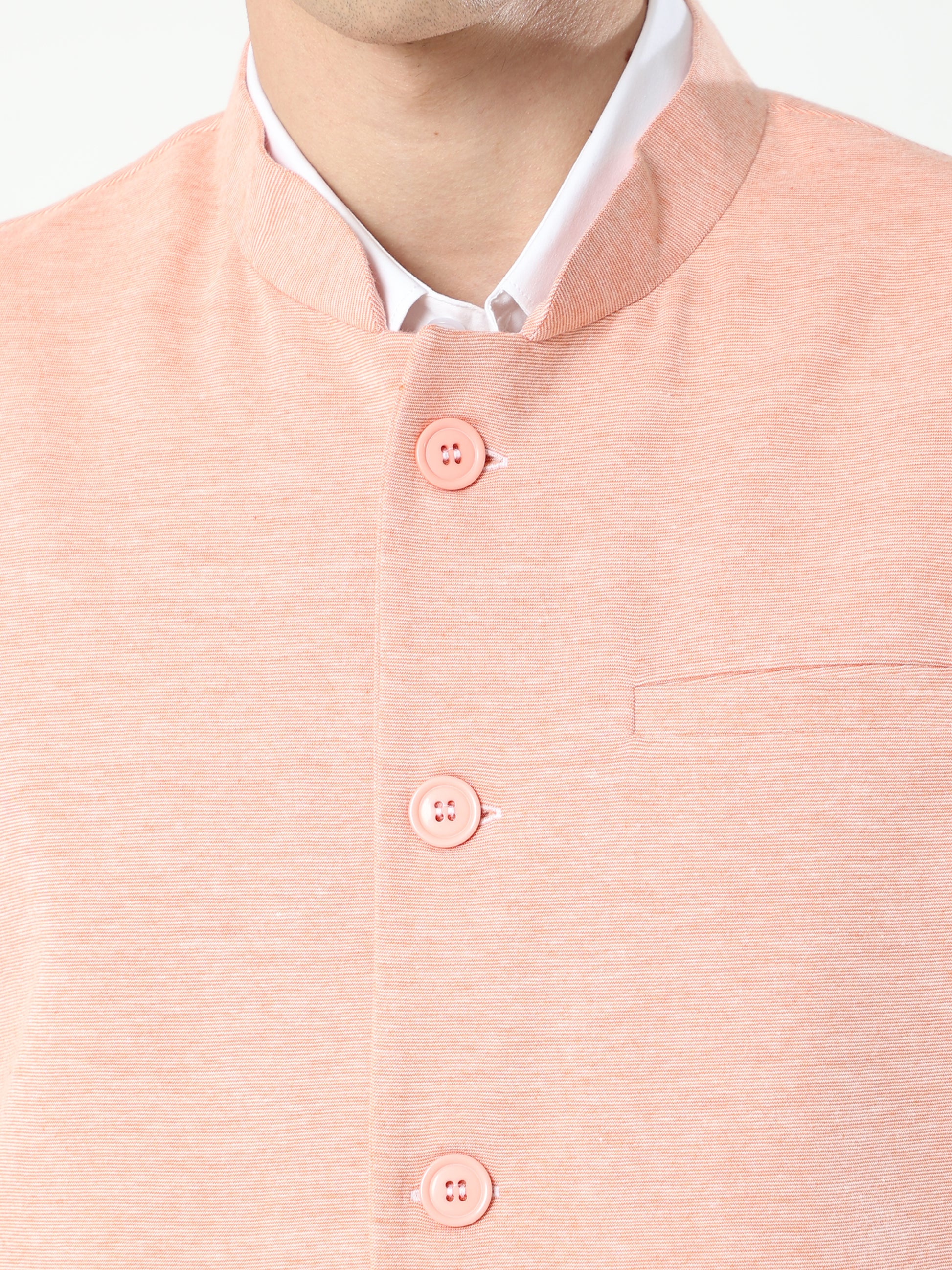 Button-front detailing on Sustainable Cotton Modi Coat Mandarin
