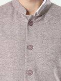 Button-front detailing on Sustainable Cotton Modi Coat Nut Brown


