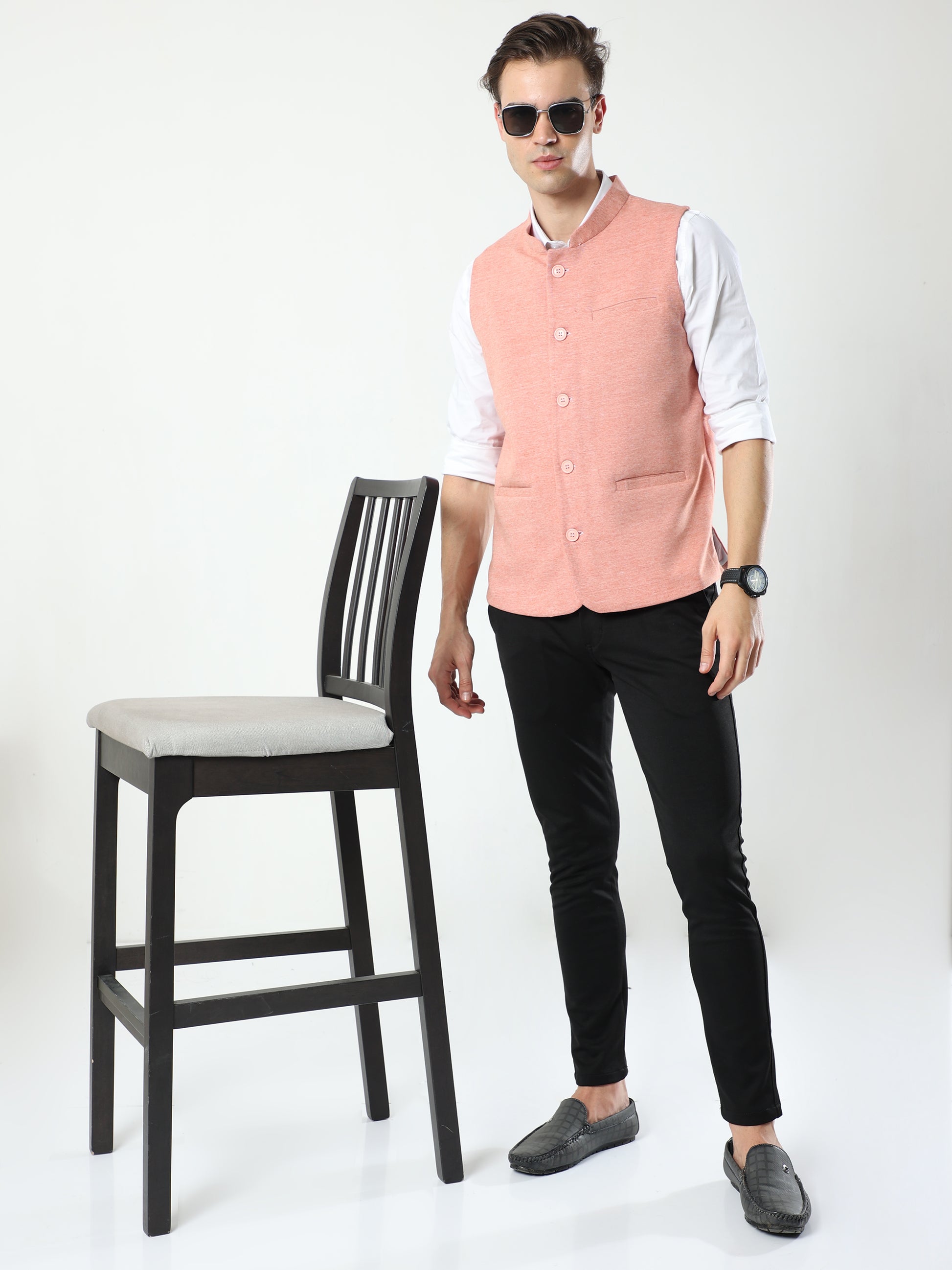 Model wearing Men’s Sustainable Cotton Modi Coat Scarlet styled with kurta
