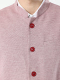 Button-front detailing on Sustainable Cotton Modi Coat Maroon
