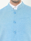 Button-front detailing on Sustainable Cotton Modi Coat Cyan
