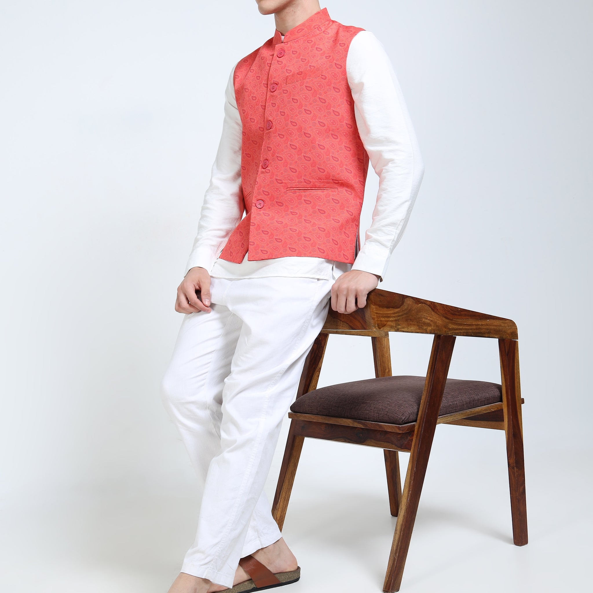 Side angle of model in Coral Field Printed Modi Jacket paired with kurta