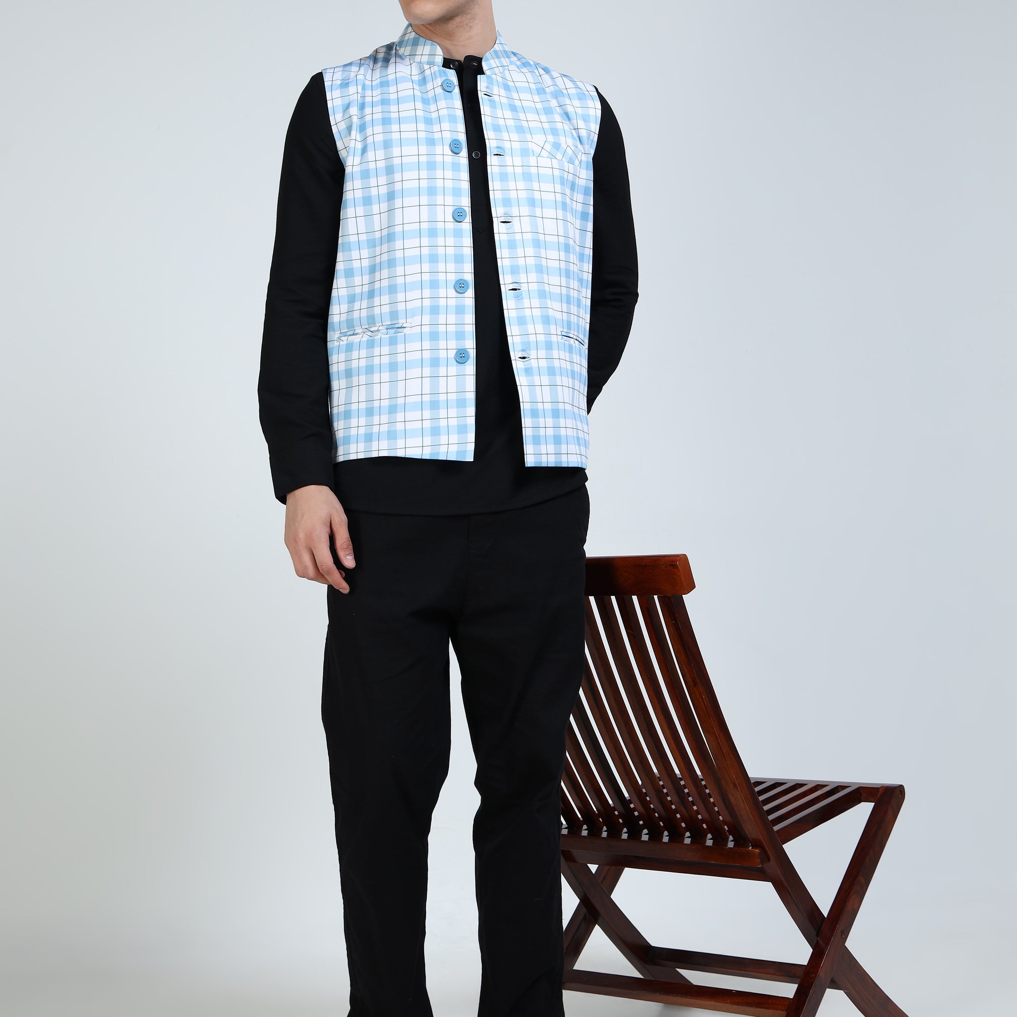 Side angle of model in Blue Gingham Printed Modi Jacket paired with kurta