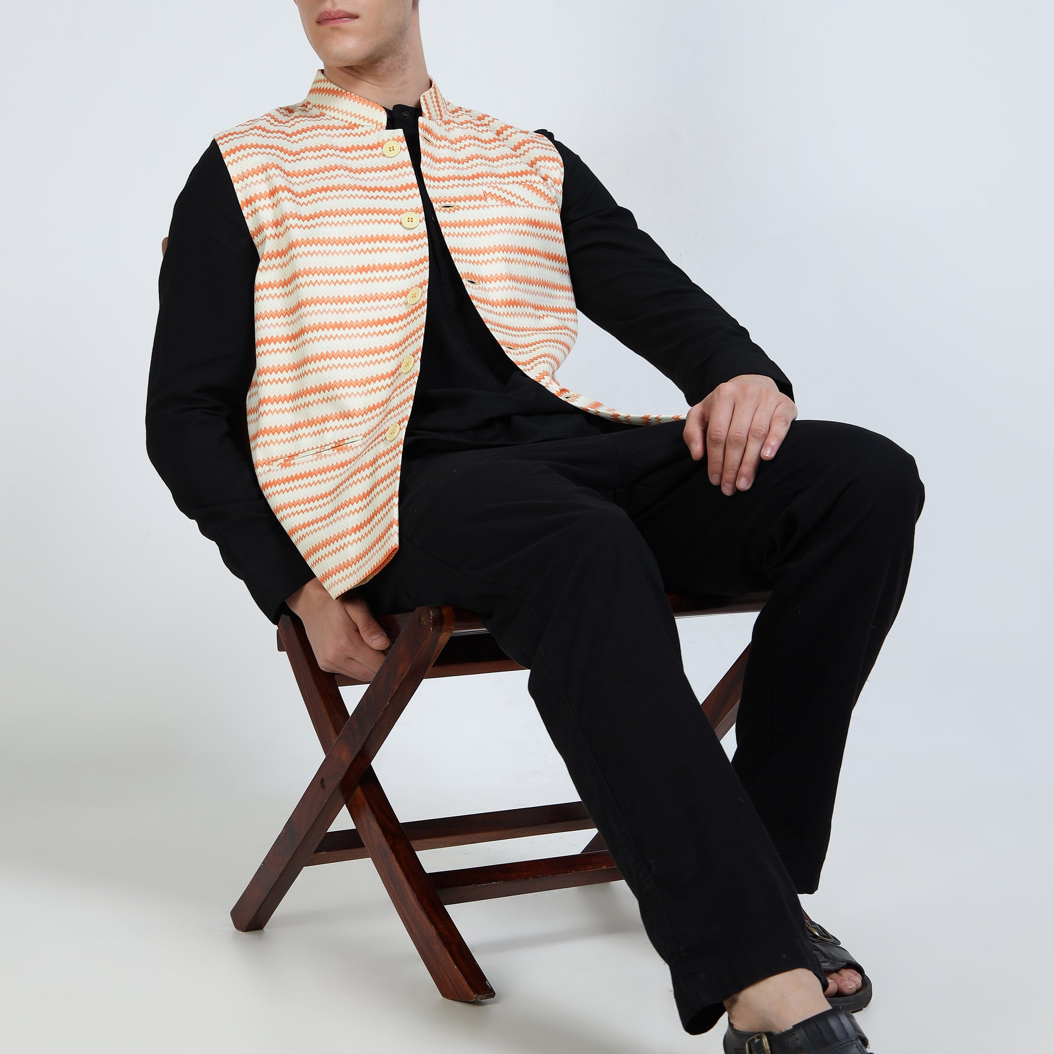 Side angle of model in Wavy Stripes Modi Jacket paired with kurta