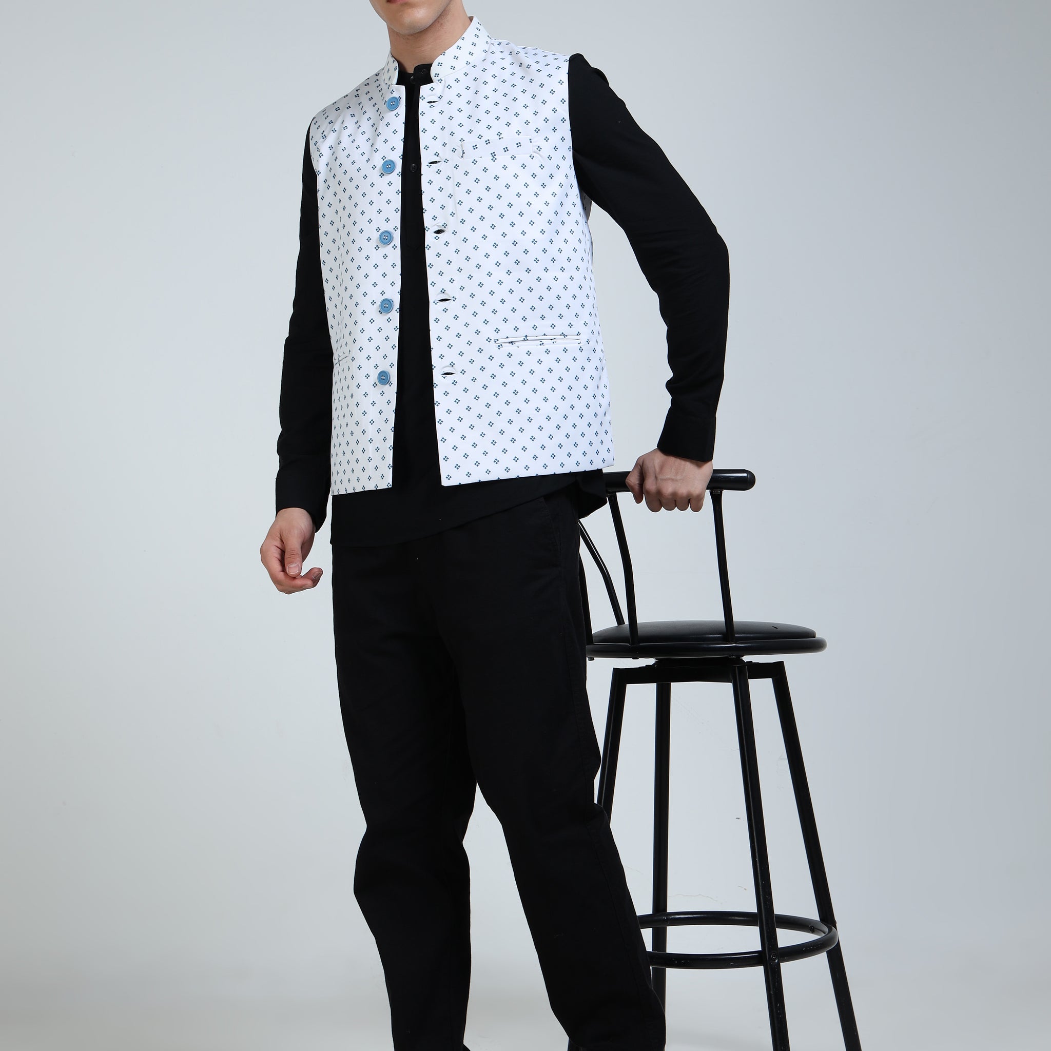 Lifestyle shot of model wearing Printed Modi Coat Micro Tile