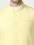Button-front detailing on Sustainable Cotton Modi Coat Lemon
