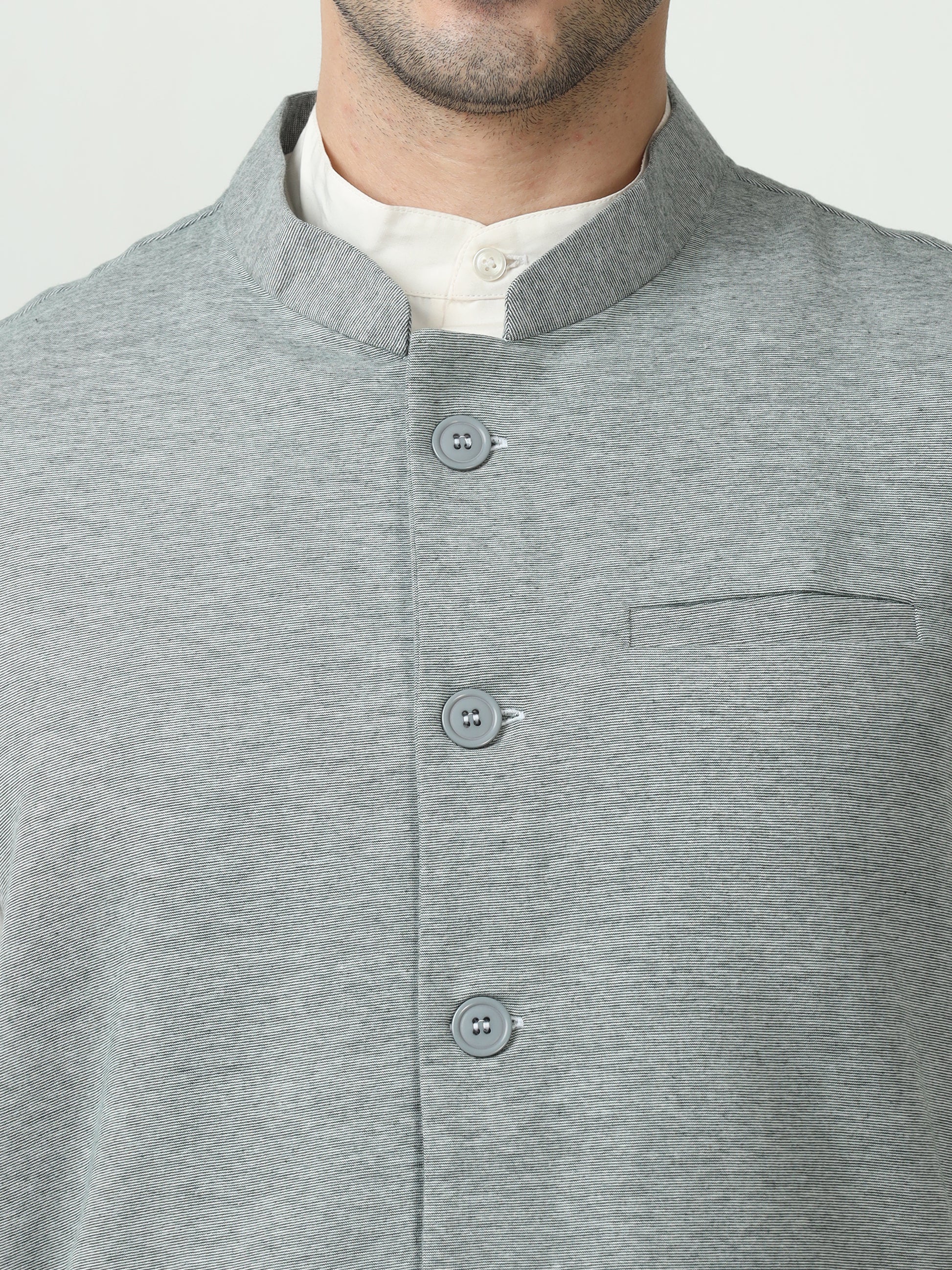 Close-up of Mandarin collar on Bottle Green Sustainable Cotton Modi Jacket

