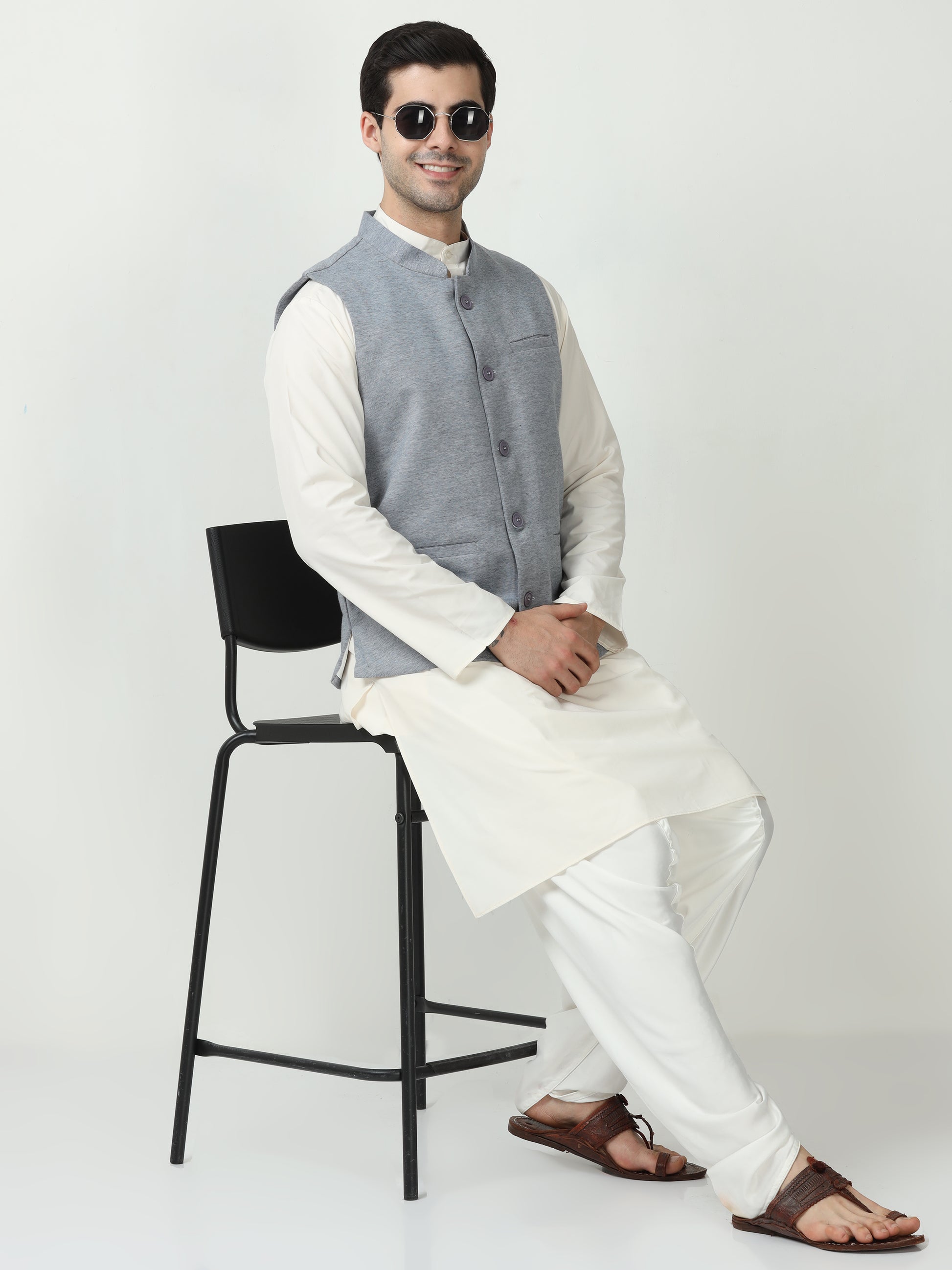 Model wearing Men’s Sustainable Cotton Modi Coat Navy styled with kurta
