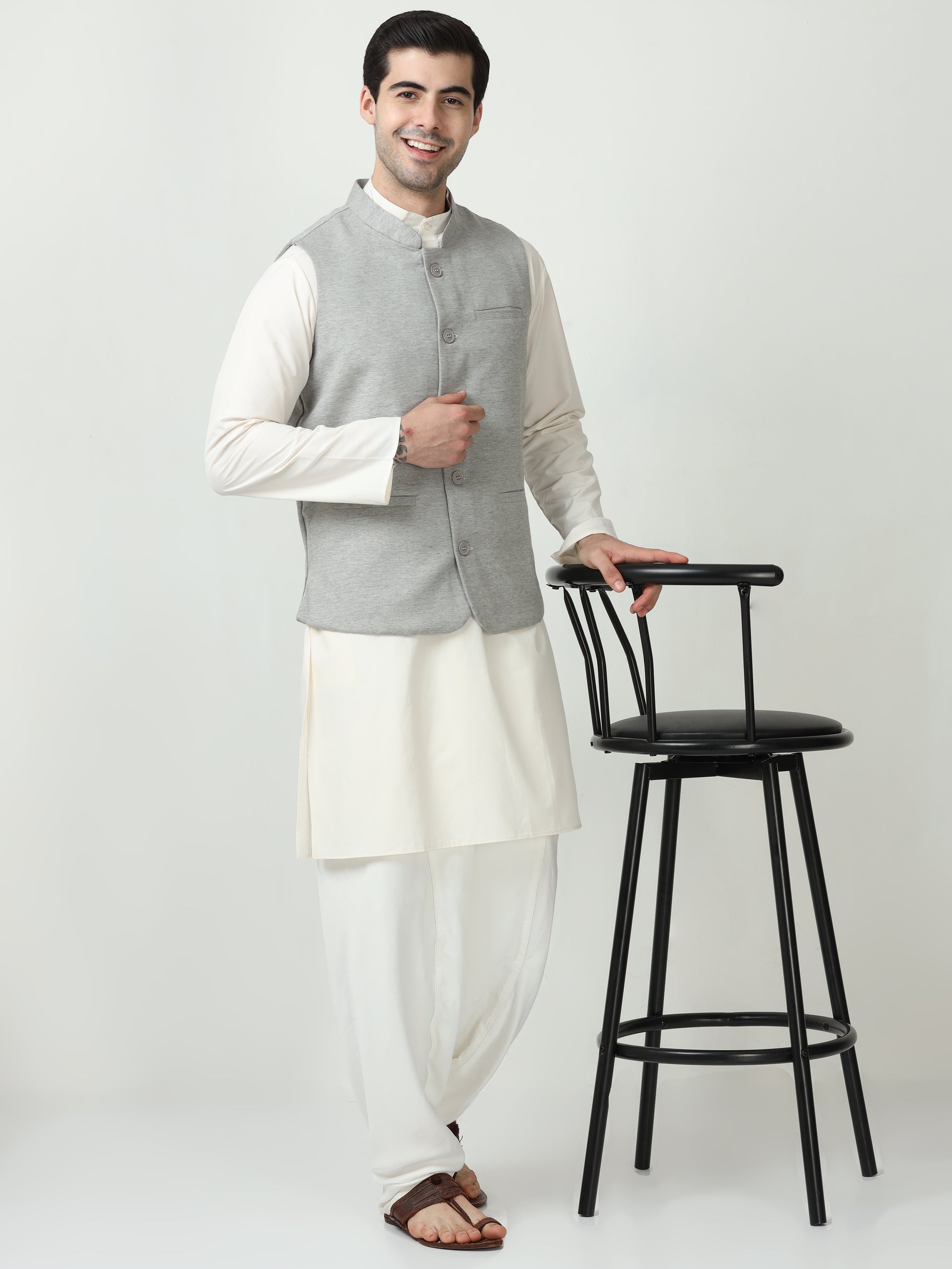 Model wearing Men’s Sustainable Cotton Modi Coat Steel Grey styled with kurta
